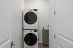 Stacked washer/dryer for guest convenience